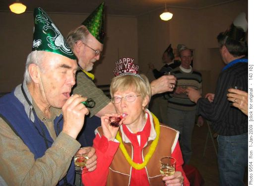 {162 Pete Fischer} & {164 Mar Flan} making noise, {165 Ton For} toasting behind