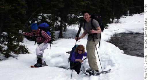 Carolyn dipping her feet into Paradise Creek