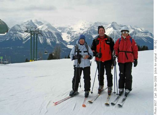 Downhill skiers at the top of Grizzly Express